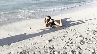 Hot Monika Fox in Ebony Bodysuit on Beach
