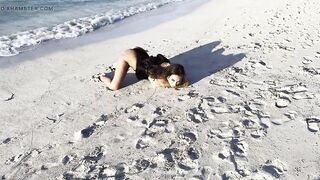 Hot Monika Fox in Ebony Bodysuit on Beach