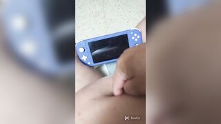 Playing nintendo switch and this babe shove my navel so nice