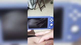 Playing nintendo switch and this babe shove my navel so nice