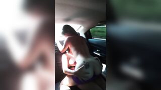Sexy cuties make episode in a car scissoring