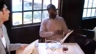 A Cook Is Cut by Her Customers in the Kitchen.