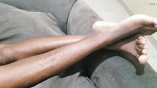 A Woman with Tons of Charming Pubic Hair Between Her Legs Lies on Her Sofa Awaiting to Be Made Love to Her