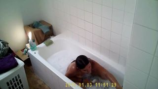 Big tittied college teen cums hard in tub