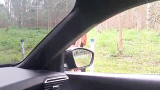 flashing his rod at a hotty in the car!