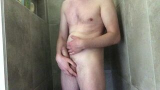 I wash myself in the shower and stroke a large ramrod and cum, the goo is visible close up on camera