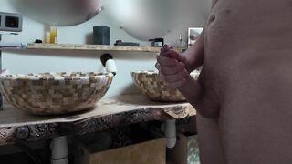 I stroke a large ramrod in the shitter