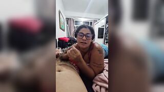 The redhead masturbates her spouse and tells him stories until this guy ejaculates in her throat.