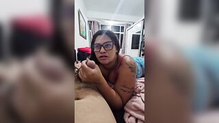 The redhead masturbates her spouse and tells him stories until this guy ejaculates in her throat.