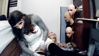 Emily's Masks Pt2! Doll masked Celli plays with her rubber self and her constricted white suit!