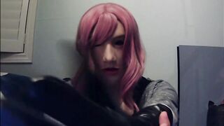 Masked in Anine female mask with pink wig and putting on ebony leather gloves!