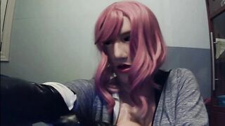 Masked in Anine female mask with pink wig and putting on ebony leather gloves!