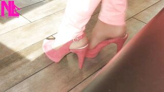 Shoeplay with High Heels in a Bar