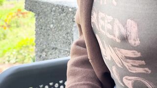 Teasing my spouse in a sheer shirt exposing large pierced nipps in oudoor coffee place