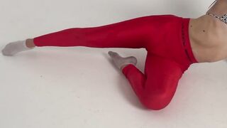 taut red leggings yoga legs
