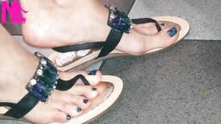 Dangling and Shoeplaying in a Bar with My Blue Estrada' Flip Flops