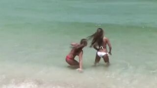 two beautiful porn star fucking on a deserted beach