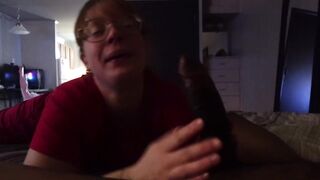 White cutie in glasses gives mouth to a Ebony Dick