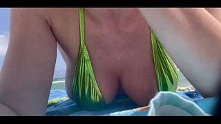 Artemisia Love at the public beach showing her ideal bazookas