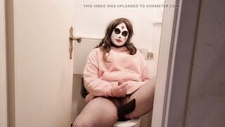 Youthful trans woman jerks off in the shitter