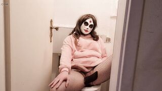 Youthful trans woman jerks off in the shitter