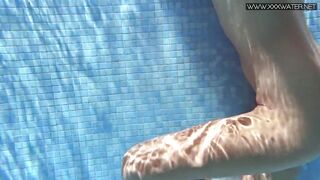Renowned Mary Kalisy is posing swimming in nature's garb for XXXWATER