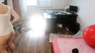 Amateur woman has joy trying on clothing and cutting 'em.