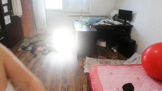 Amateur woman has joy trying on clothing and cutting 'em.