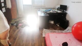 Amateur woman has joy trying on clothing and cutting 'em.