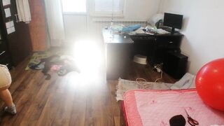 Amateur woman has joy trying on clothing and cutting 'em.
