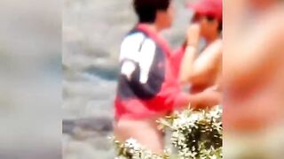 Chubby lesbian caught kissing on the beach