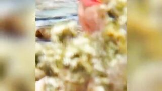 Chubby lesbian caught kissing on the beach