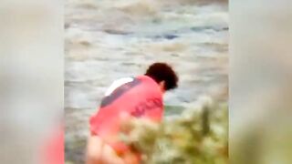 Chubby lesbian caught kissing on the beach