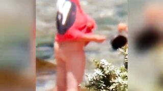 Chubby lesbian caught kissing on the beach