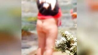 Chubby lesbian caught kissing on the beach