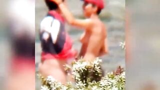 Chubby lesbian caught kissing on the beach