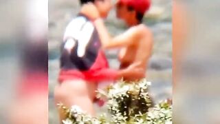Chubby lesbian caught kissing on the beach