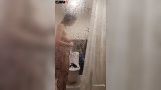 Check out this steamy shower scene with sexy undressed Simon