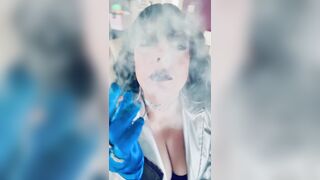 Clothed In Silver & Gloves & Rings Tina Snua Smoke A Supeking Cigarette
