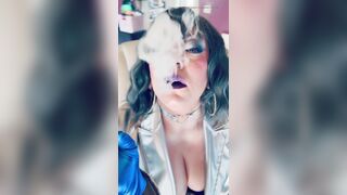Clothed In Silver & Gloves & Rings Tina Snua Smoke A Supeking Cigarette