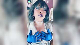 Clothed In Silver & Gloves & Rings Tina Snua Smoke A Supeking Cigarette