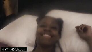 A breathtaking black hottie solo on the couch masturbates