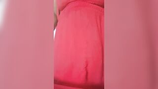 A barefaced believer lifts her suit in the church aisle and shows her snatch to the congregation.