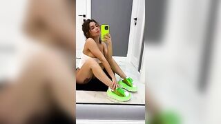 I'm sitting in front of the mirror, touching my twat