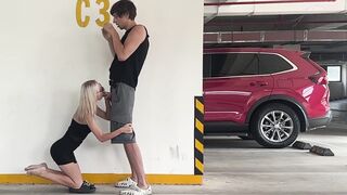Unknown blond bangs in a parking lot in plain sight