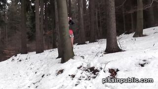 Gals in need skate around in the snow to discover a proper place to have a pee
