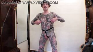 Tattoo Male LeeHarper Pinnomen Show Off With a Borrowed Fancy Constricted Beltstrap used in the Boy Stripshow Production - 2 Rings are Attached to the Thong - Enabling a Stripper With a P/A to Suspend His