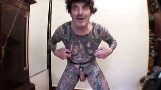 Tattoo Male LeeHarper Pinnomen Show Off With a Borrowed Fancy Constricted Beltstrap used in the Boy Stripshow Production - 2 Rings are Attached to the Thong - Enabling a Stripper With a P/A to Suspend His