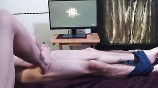 Sneaking footjob into gamer hotty's playtime