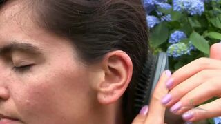 Slutty bushy honey sunbathes and masturbates with her vibrating hair brush.